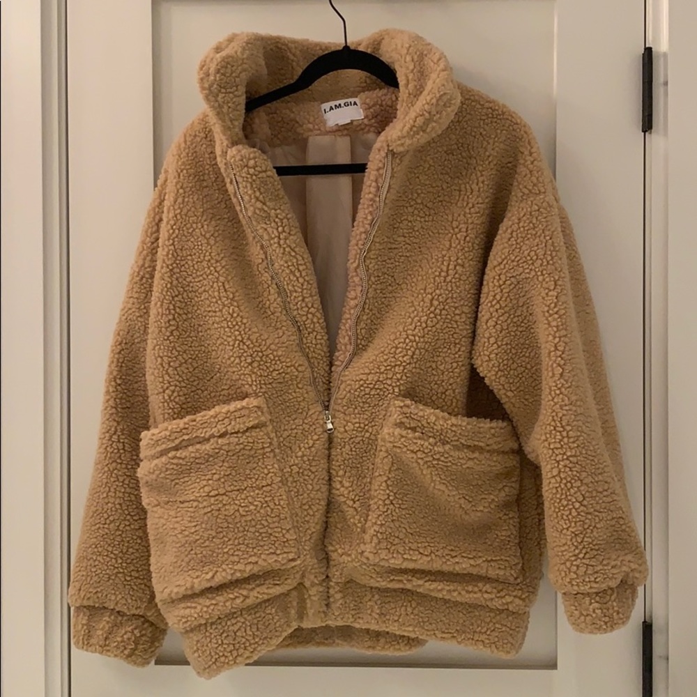 I am Gia pixie coat in a size small Carmel color.